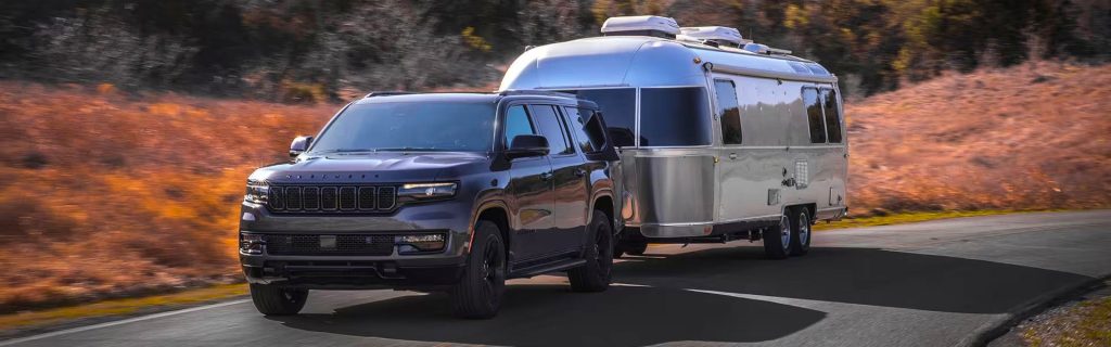Jeep Wagoneer hauling a trailer